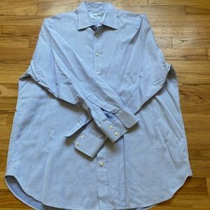 Men’s blue and white dress shirt.